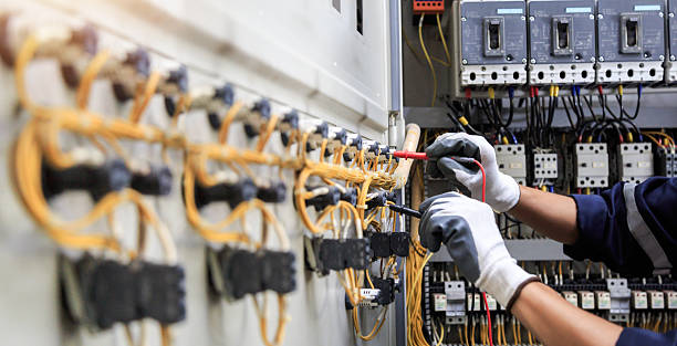 Professional Electrician technician working in Surfside, FL